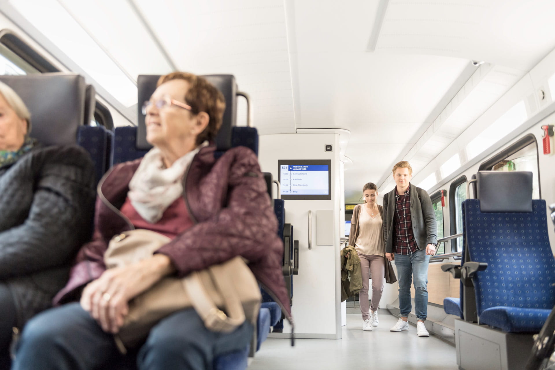 Reisende im Zug